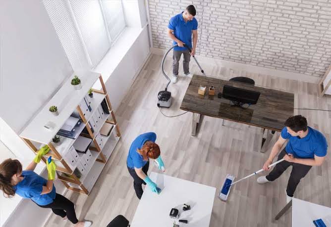 Cleaning professional preparing a room
